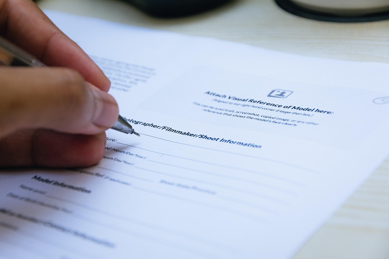 Editorial photo for Emotional Abuse In Professional Sports: Legal Options For Athlete Well-Being, showing legal research and consultation documents.