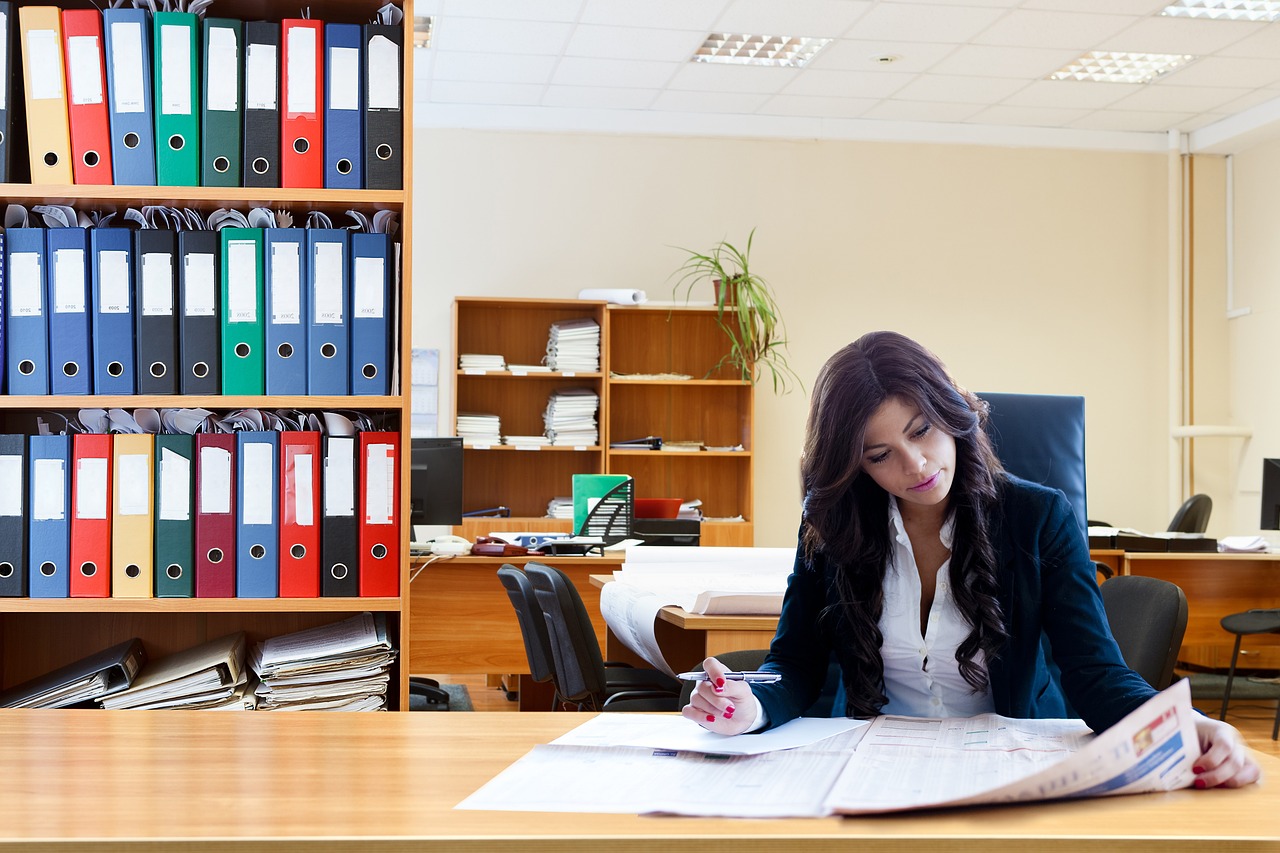 Editorial photo for Breach Of Non-Disclosure Agreement In Cryptocurrency Development: Protecting Confidential Blockchain Technologies And Ico Plans, showing employment records and workplace documents.