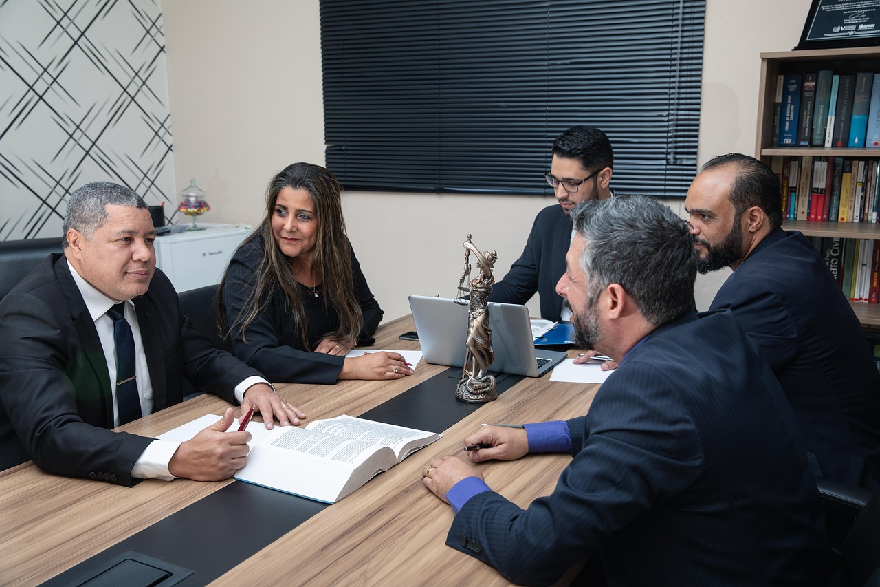Editorial photo for Breach Of Non-Disclosure Agreement In Video Game Publishing: Protecting Confidential Game Concepts And Marketing Strategies, showing legal research and consultation documents.