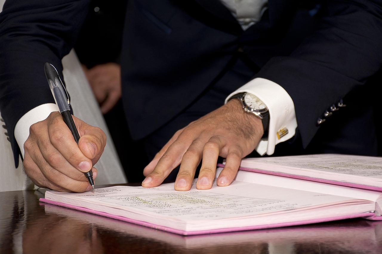 Editorial photo for Employment Lawsuits: Protecting Your Rights In The Workplace, showing employment records and workplace documents.