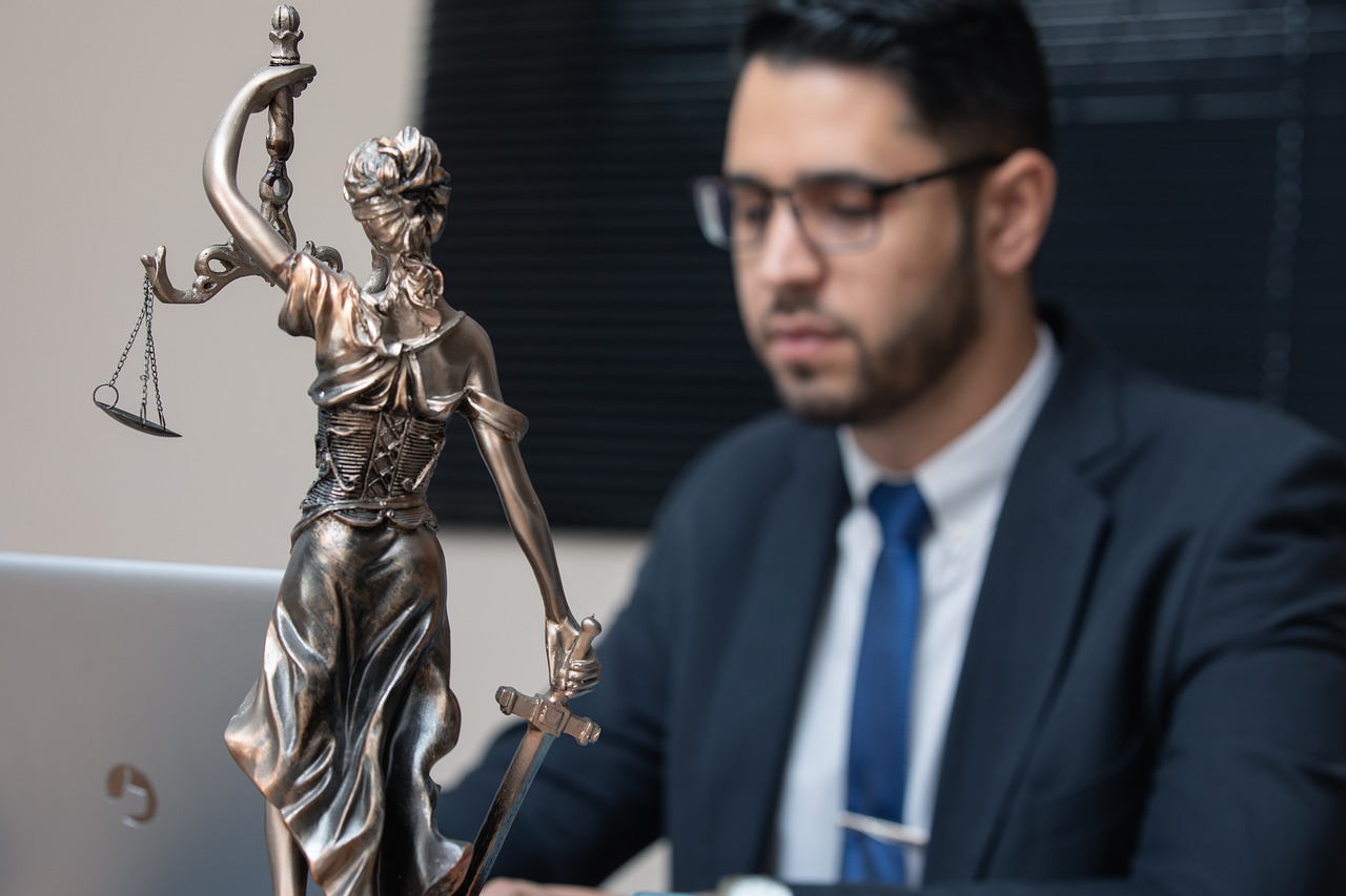 Editorial photo for What to Do When an Employer Calls Your Resignation Voluntary but It Wasn't, showing employment records and workplace documents.