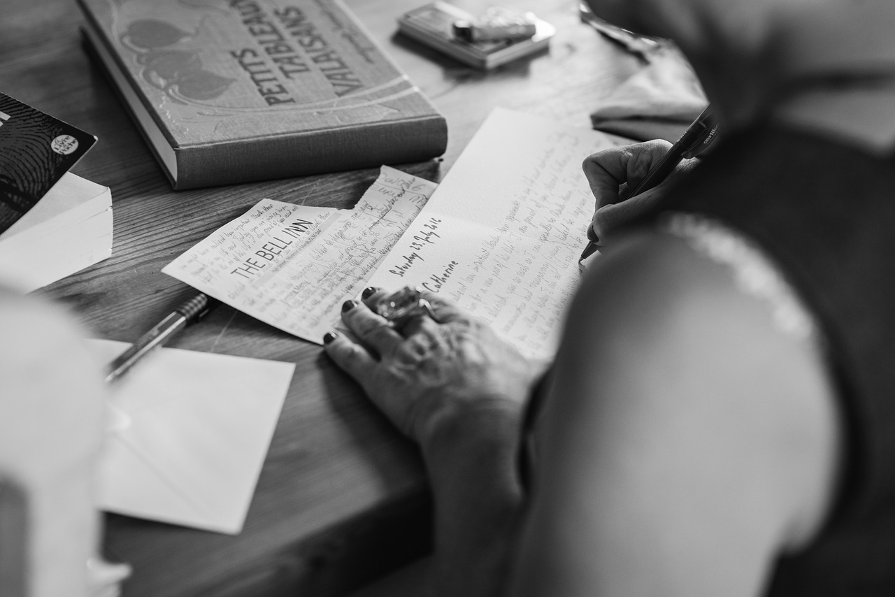 Editorial photo for Legal Malpractice: Pursuing Damages For Attorney Negligence, showing legal research and consultation documents.