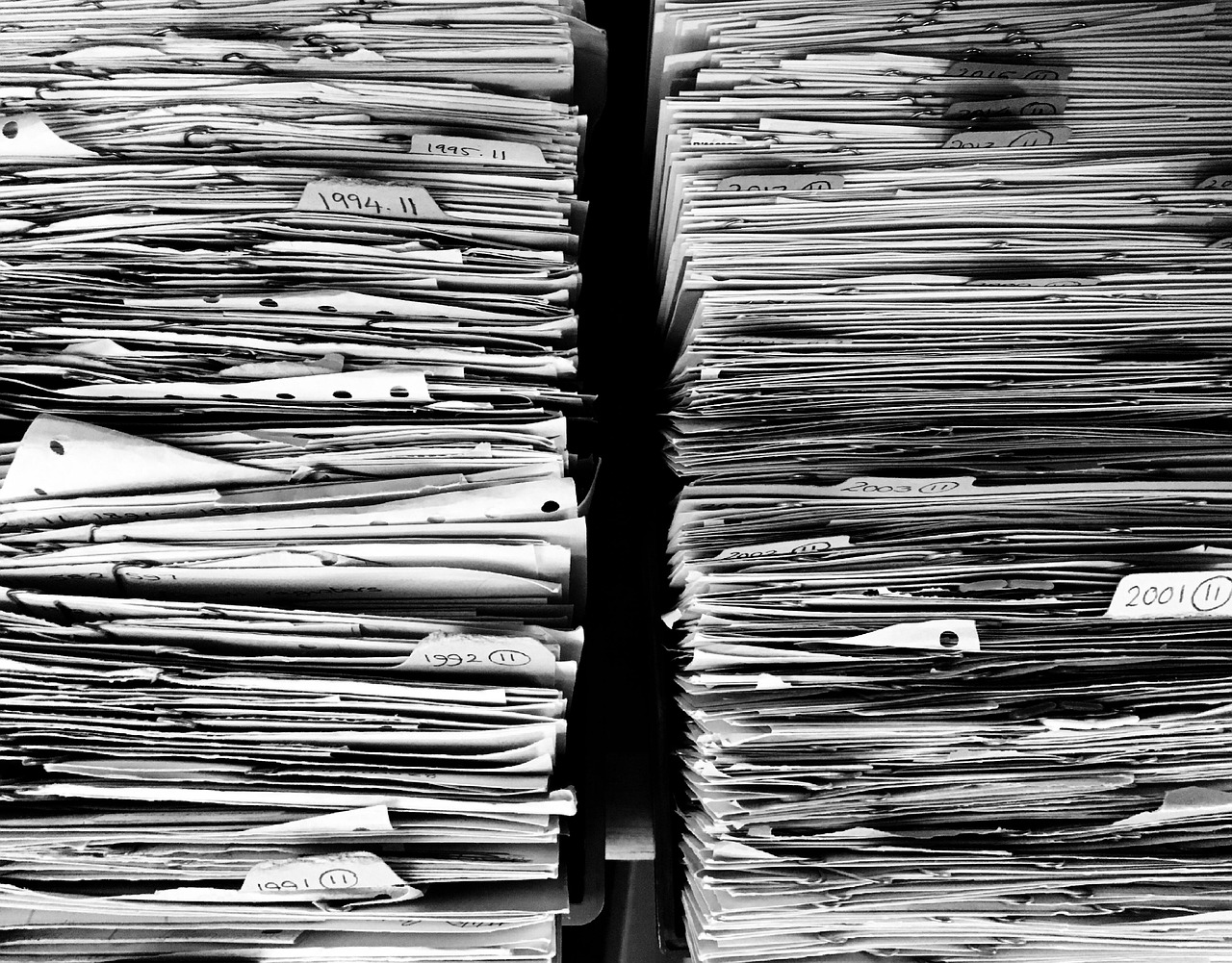 Editorial photo for Can You Dispute a Buy Now Pay Later Charge for Goods Never Received?, showing consumer bills, debt, refunds, and warranty records.