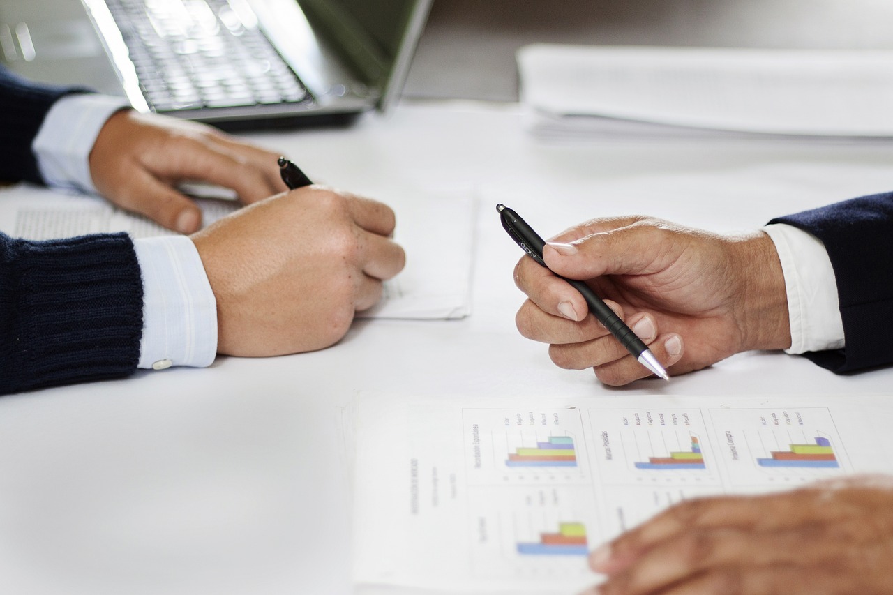 Editorial photo for Emotional Distress In The Workplace: Legal Recourse For Hostile Environments, showing employment records and workplace documents.